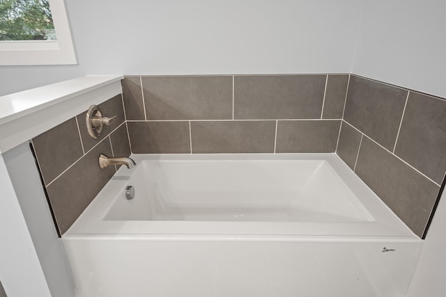 full bathroom with a bath