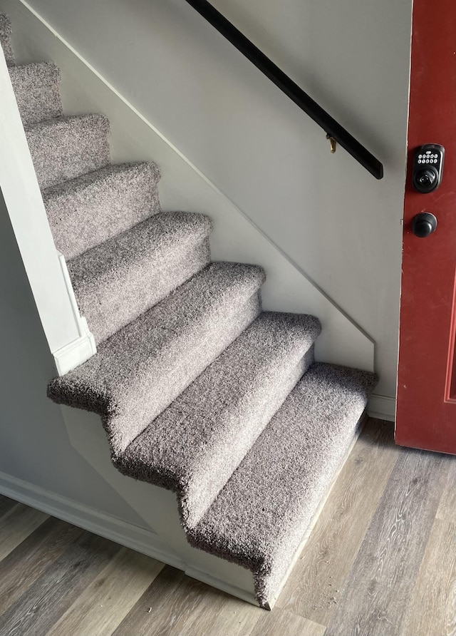 223 Edgewood Dr, Hendersonville, TN 37075 - stairway with baseboards and wood finished floors