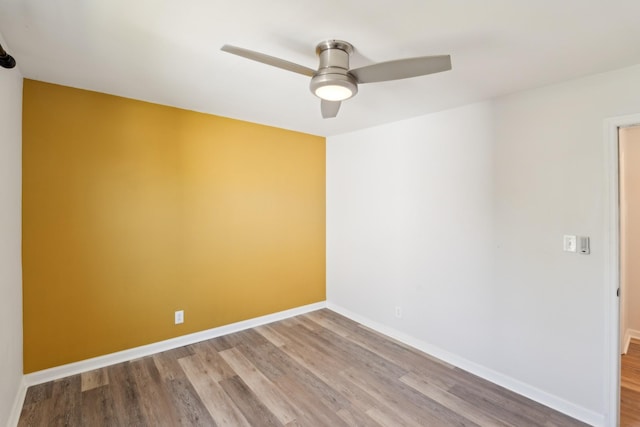 223 Edgewood Dr, Hendersonville, TN 37075 - spare room featuring wood finished floors, baseboards, and a ceiling fan