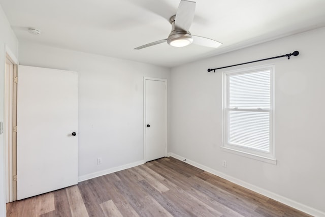 223 Edgewood Dr, Hendersonville, TN 37075 - unfurnished bedroom with ceiling fan, baseboards, and wood finished floors