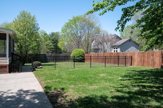 view of yard with a gate and fence