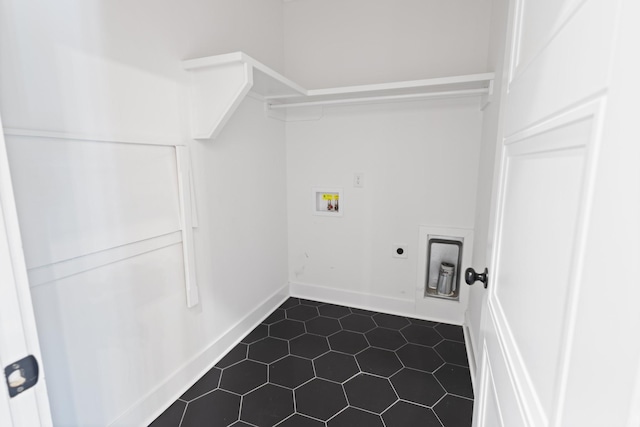 6913 Pembrooke Farms Dr, Murfreesboro, TN 37129 - laundry room with dark tile patterned flooring, hookup for an electric dryer, baseboards, laundry area, and washer hookup