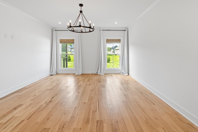6913 Pembrooke Farms Dr, Murfreesboro, TN 37129 - unfurnished dining area with light wood-type flooring, crown molding, baseboards, and a notable chandelier