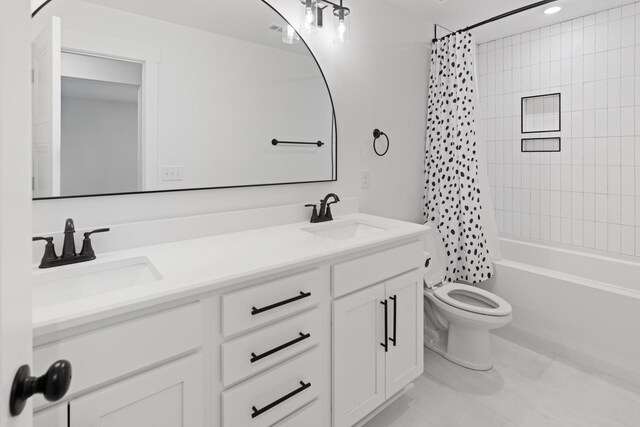 6913 Pembrooke Farms Dr, Murfreesboro, TN 37129 - bathroom featuring toilet, a sink, double vanity, and shower / bathtub combination with curtain