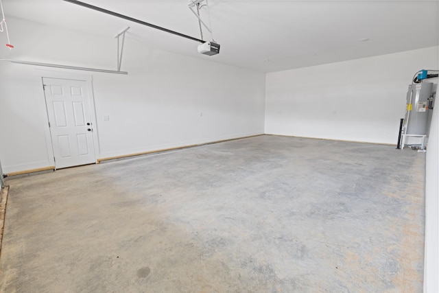 6913 Pembrooke Farms Dr, Murfreesboro, TN 37129 - garage featuring water heater and a garage door opener