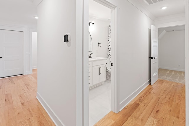 6913 Pembrooke Farms Dr, Murfreesboro, TN 37129 - hallway featuring baseboards, ornamental molding, and light wood finished floors
