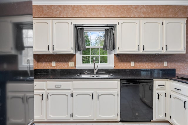 kitchen with a sink, black appliances, white cabinetry, and crown molding