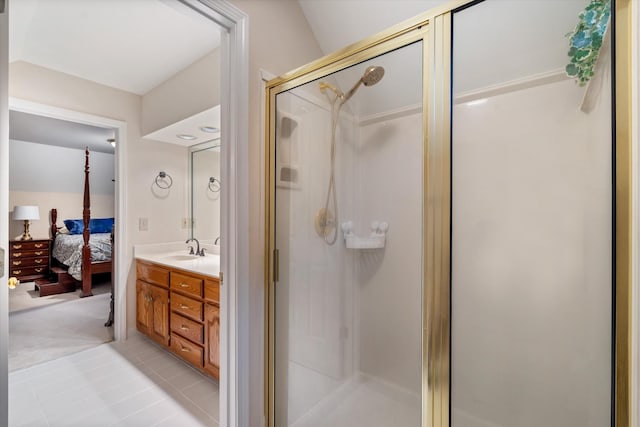 full bathroom featuring a shower stall, tile patterned floors, ensuite bath, and vanity