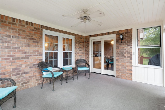 view of patio with ceiling fan