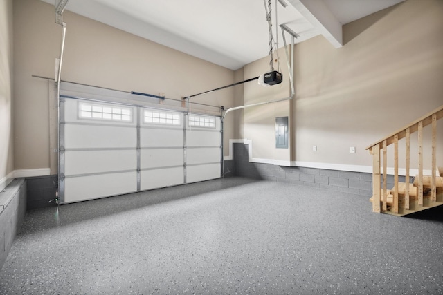 51 Gratton Ests, Clarksville, TN 37043 - garage featuring a garage door opener and concrete block wall