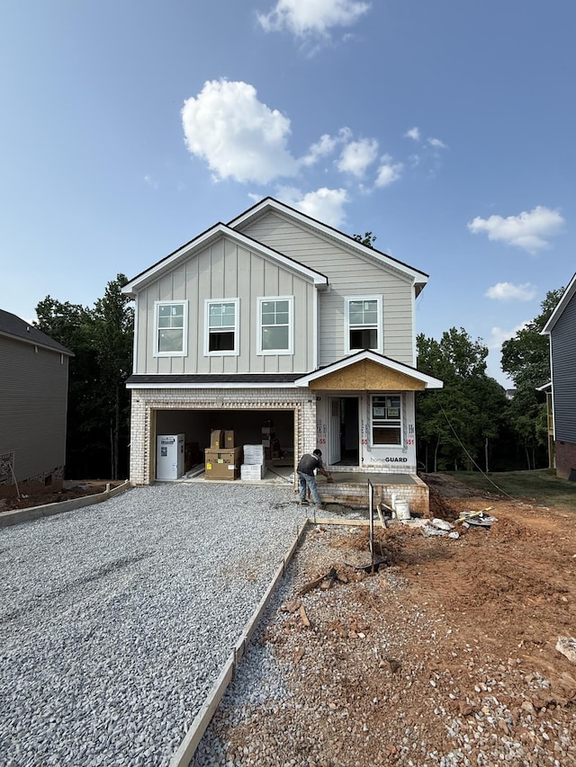 51 Gratton Ests, Clarksville, TN 37043 - view of front of property featuring driveway, an attached garage, board and batten siding, and covered porch