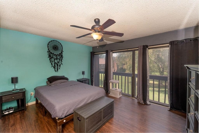 bedroom featuring access to outside, a textured ceiling, a ceiling fan, and wood finished floors