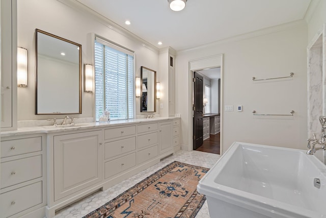 4535 Peytonsville Rd, Franklin, TN 37064 - bathroom featuring a freestanding bath, double vanity, a sink, and ornamental molding