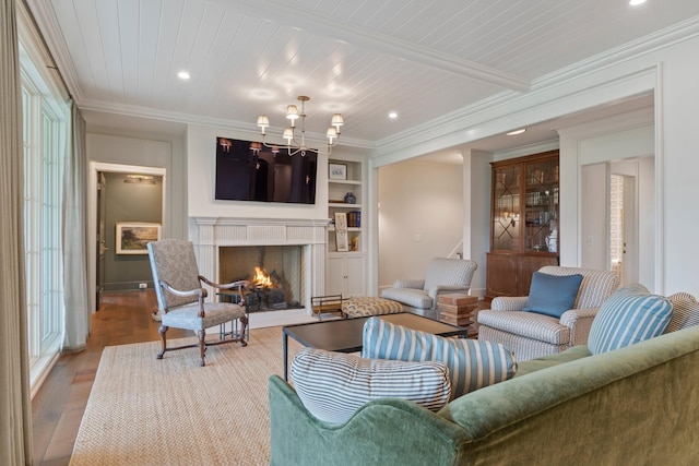 4535 Peytonsville Rd, Franklin, TN 37064 - living room featuring built in features, a chandelier, recessed lighting, a high end fireplace, and wood finished floors