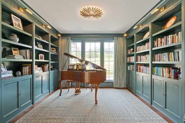 4535 Peytonsville Rd, Franklin, TN 37064 - living area featuring built in features, wall of books, and ornamental molding