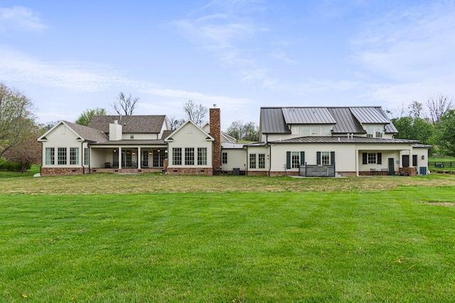 4535 Peytonsville Rd, Franklin, TN 37064 - back of house with a yard, metal roof, crawl space, and a chimney