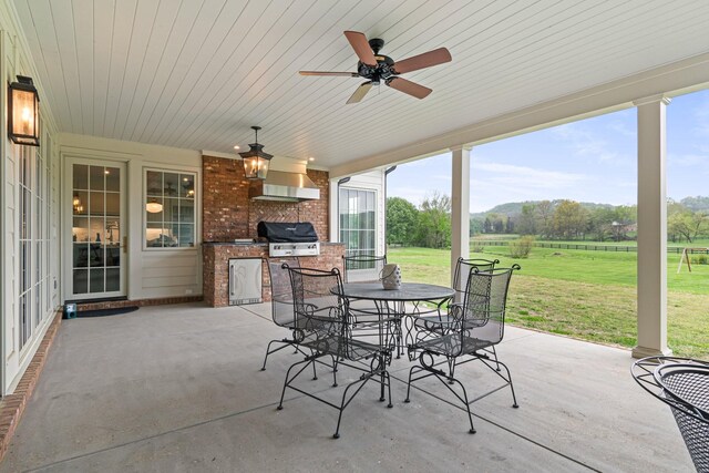 4535 Peytonsville Rd, Franklin, TN 37064 - view of patio featuring area for grilling, a rural view, ceiling fan, and outdoor dining area