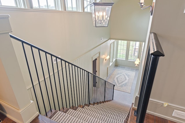 4535 Peytonsville Rd, Franklin, TN 37064 - stairway with an inviting chandelier and wood finished floors
