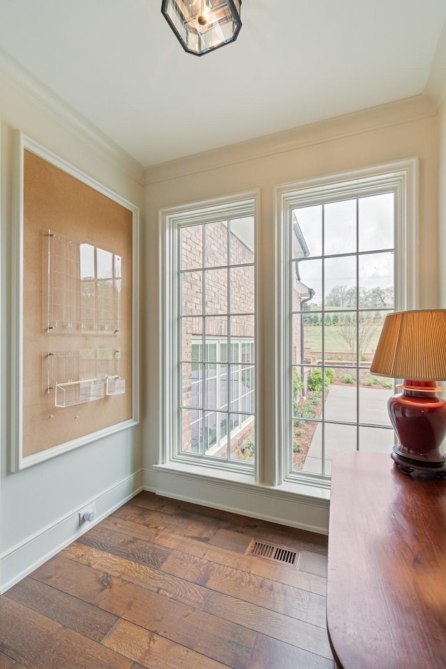 4535 Peytonsville Rd, Franklin, TN 37064 - doorway to outside with ornamental molding, visible vents, baseboards, and hardwood / wood-style floors
