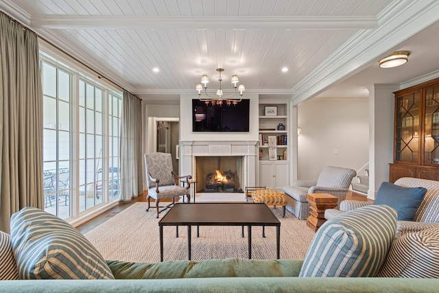 4535 Peytonsville Rd, Franklin, TN 37064 - living room with wood finished floors, an inviting chandelier, a high end fireplace, and a wealth of natural light