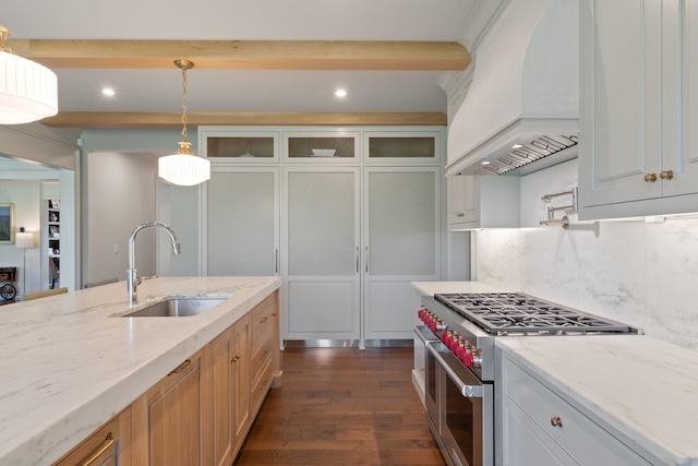 4535 Peytonsville Rd, Franklin, TN 37064 - kitchen with a sink, range with two ovens, custom range hood, dark wood-style floors, and beam ceiling