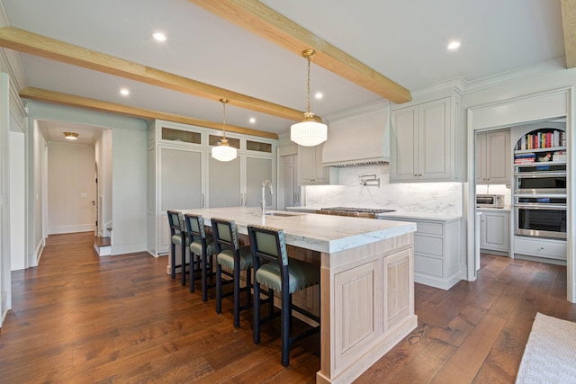 4535 Peytonsville Rd, Franklin, TN 37064 - kitchen with a sink, premium range hood, beamed ceiling, recessed lighting, and a large island with sink