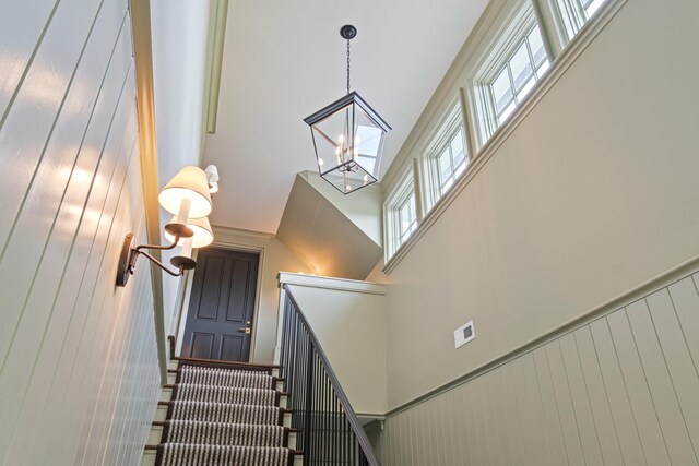 4535 Peytonsville Rd, Franklin, TN 37064 - stairway with a notable chandelier, a high ceiling, and visible vents