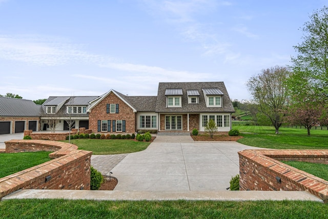 4535 Peytonsville Rd, Franklin, TN 37064 - view of front of home with a front yard, a shingled roof, brick siding, and driveway