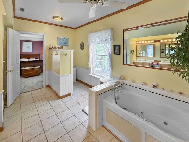 bathroom with visible vents, ornamental molding, a ceiling fan, a tub with jets, and tile patterned floors