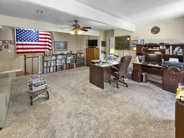 home office with visible vents, a ceiling fan, and carpet flooring