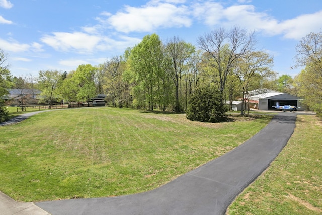 view of yard featuring a detached carport