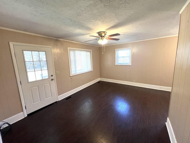 7459 Horn Tavern Rd, Fairview, TN 37062 - entrance foyer with crown molding, baseboards, a ceiling fan, and dark wood-type flooring