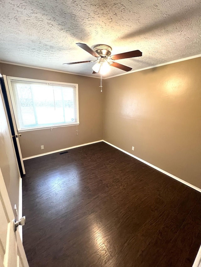 7459 Horn Tavern Rd, Fairview, TN 37062 - spare room with dark wood-style flooring, baseboards, a textured ceiling, and ceiling fan