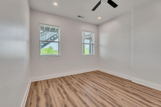 418 Mercomatic Dr, Nashville, TN 37209 - empty room with baseboards, light wood-type flooring, a ceiling fan, and recessed lighting