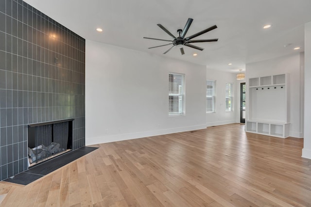 418 Mercomatic Dr, Nashville, TN 37209 - unfurnished living room with a ceiling fan, light wood-style floors, recessed lighting, a large fireplace, and baseboards