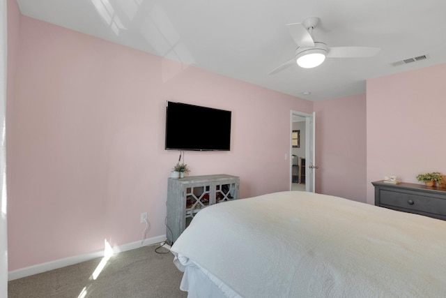 bedroom with baseboards, visible vents, carpet, and ceiling fan