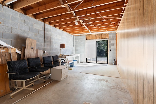 below grade area with concrete block wall