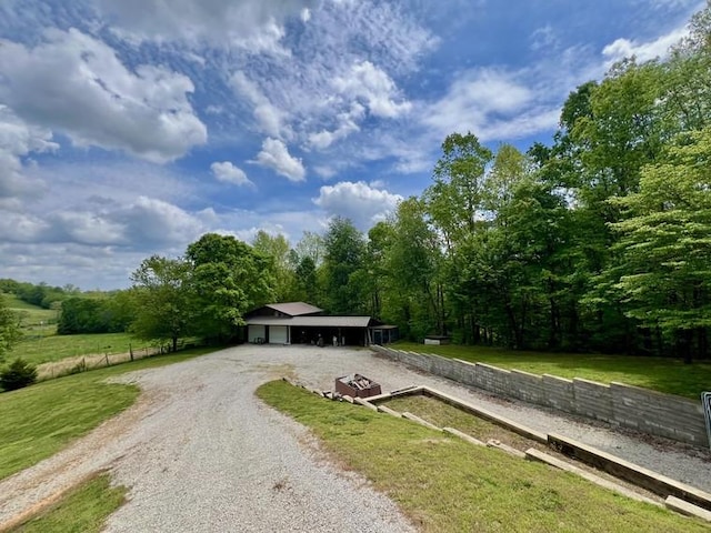 5199 Nelson Rd, Westpoint, TN 38486 - exterior space with driveway and a forest view