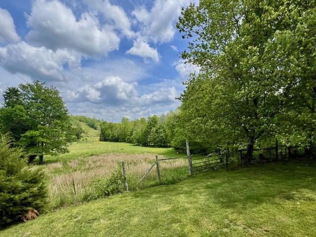 5199 Nelson Rd, Westpoint, TN 38486 - view of yard featuring fence and a rural view