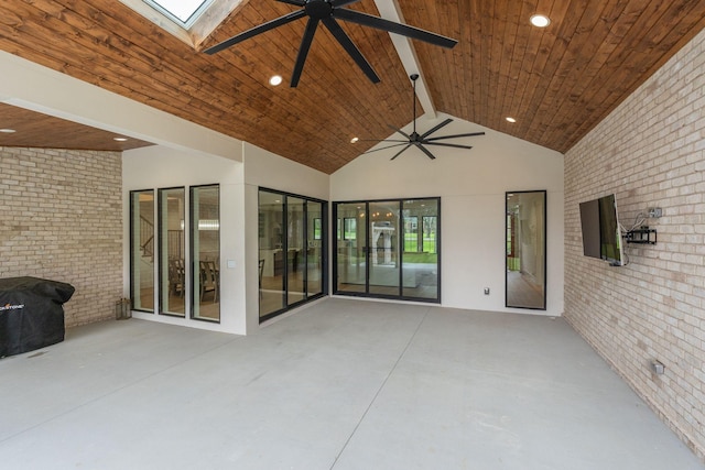 view of patio / terrace with a ceiling fan and area for grilling