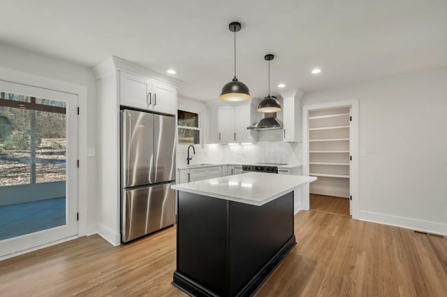 931 Downey Dr, Nashville, TN 37205 - kitchen featuring a sink, stainless steel fridge, tasteful backsplash, baseboards, and light countertops