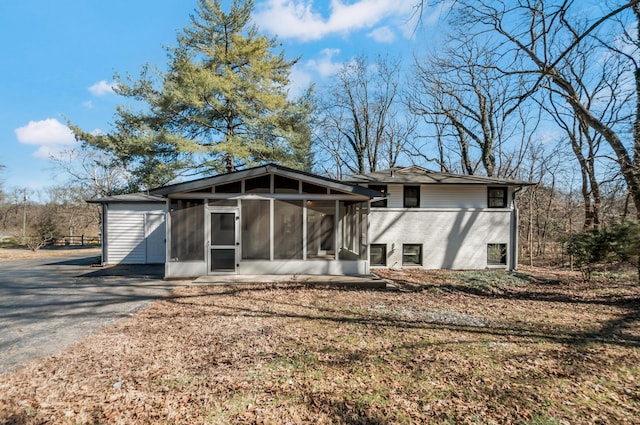 931 Downey Dr, Nashville, TN 37205 - back of house featuring a sunroom and driveway