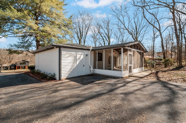 931 Downey Dr, Nashville, TN 37205 - exterior space featuring driveway and a sunroom