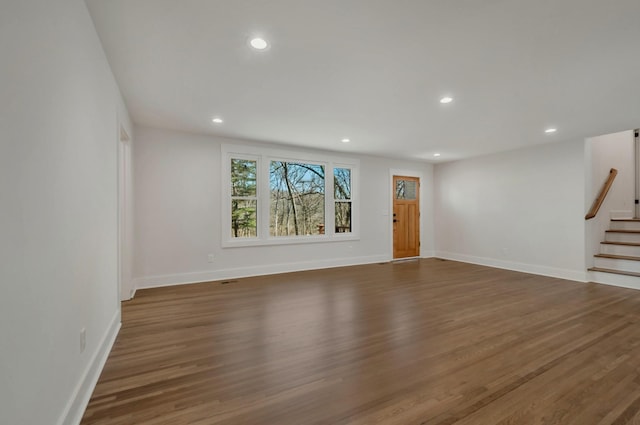 931 Downey Dr, Nashville, TN 37205 - unfurnished living room with recessed lighting, stairway, baseboards, and wood finished floors