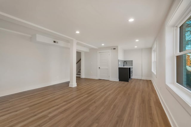 931 Downey Dr, Nashville, TN 37205 - unfurnished living room with recessed lighting, light wood-style floors, stairway, and visible vents