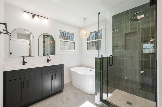 931 Downey Dr, Nashville, TN 37205 - bathroom featuring marble finish floor, a freestanding tub, a sink, and a stall shower