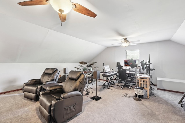 interior space featuring vaulted ceiling, baseboards, and ceiling fan