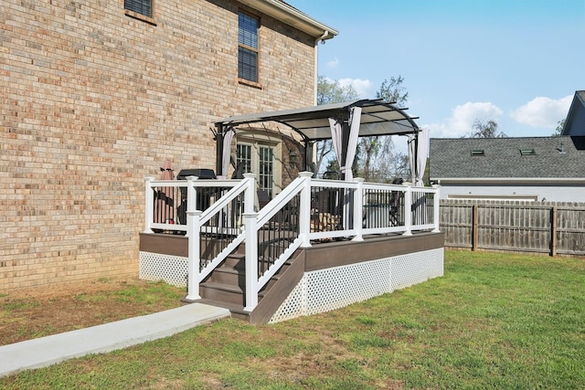 exterior space with fence, a pergola, and a yard