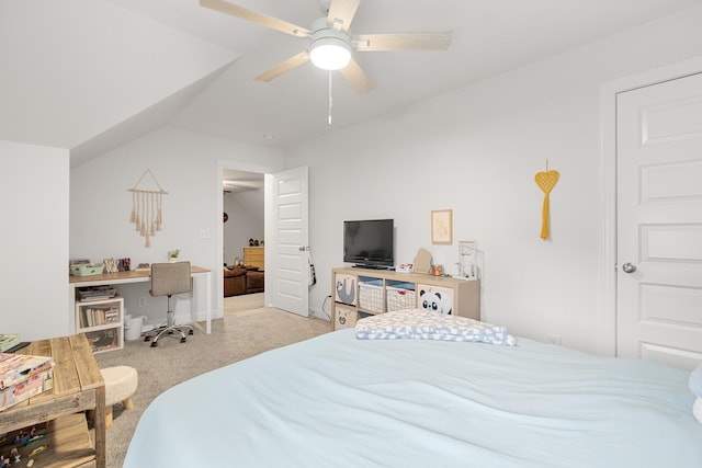 bedroom with vaulted ceiling, light colored carpet, and ceiling fan