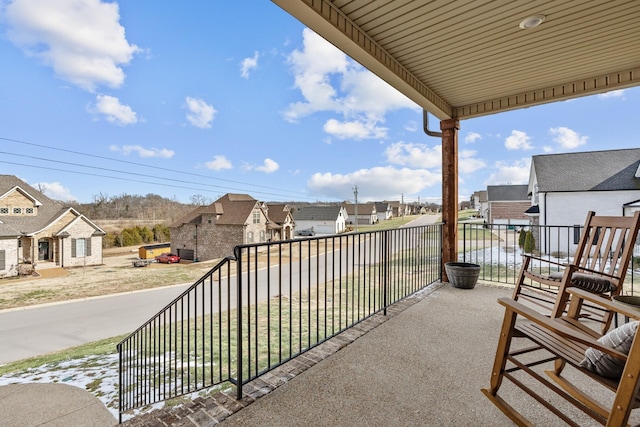 balcony featuring a residential view